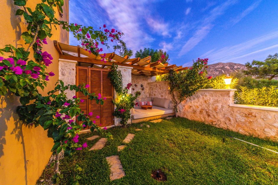 outdoor living space with patio and pergola - landscaping designer near me