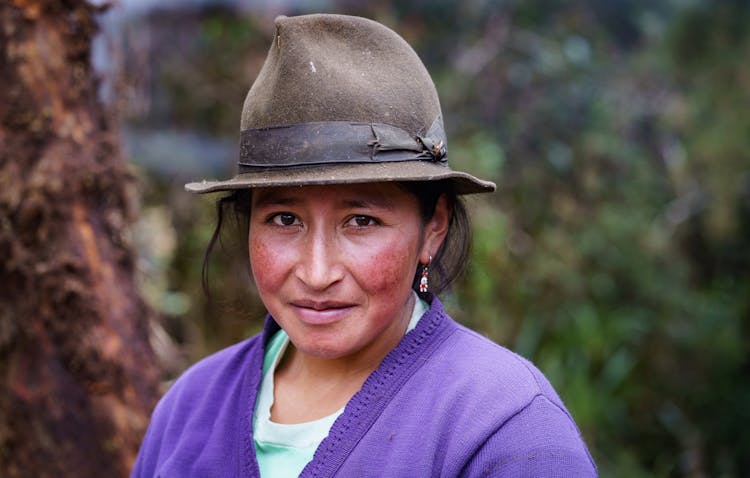 Smiling Woman In Brown Fedora Hat