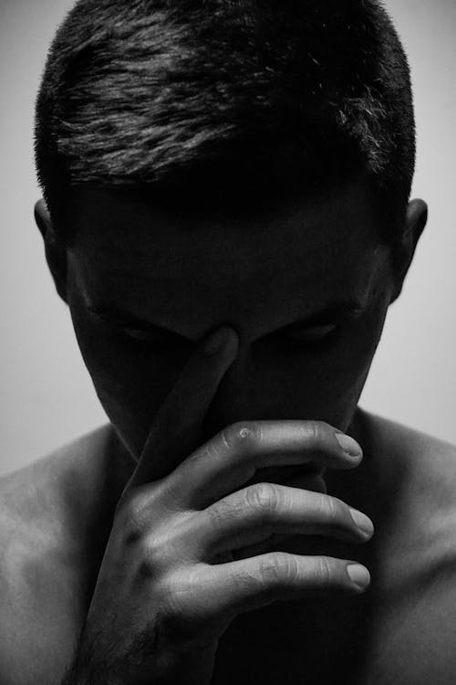 Pensive Man in Black and White