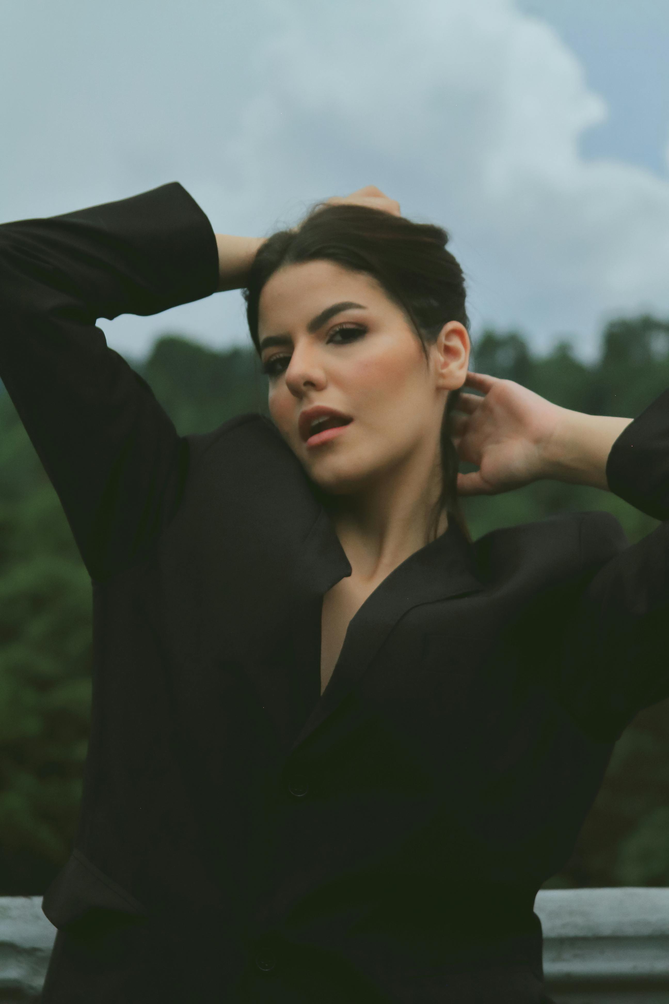 Portrait of Brunette Woman Wearing Bra and Blazer · Free Stock Photo