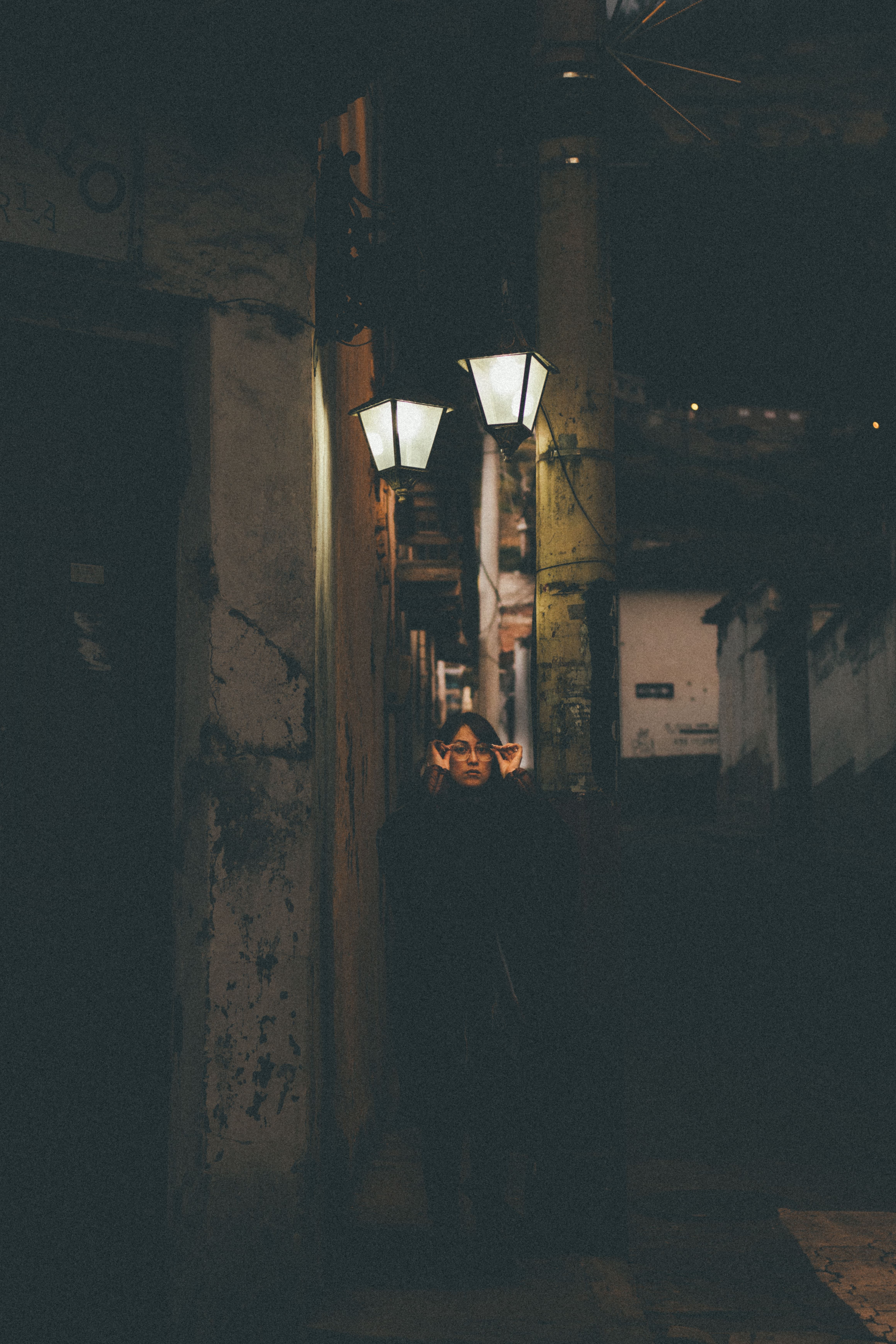 Dark Cobbled Alley with Street Lights · Free Stock Photo