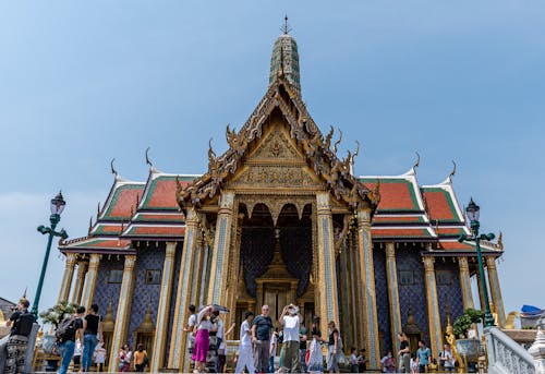 People on Stairs near Buddhist Temple