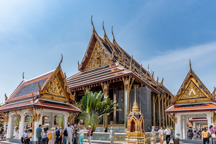 People Walking Near Buddhist Temple