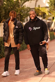 Two friends enjoy a fashionable day outdoors in Miami Beach.
