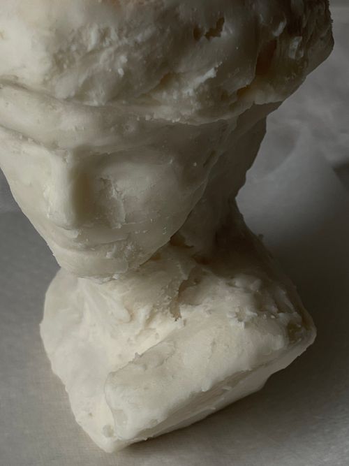 Free Close-up view of a marble sculpture bust with intricate details. Stock Photo