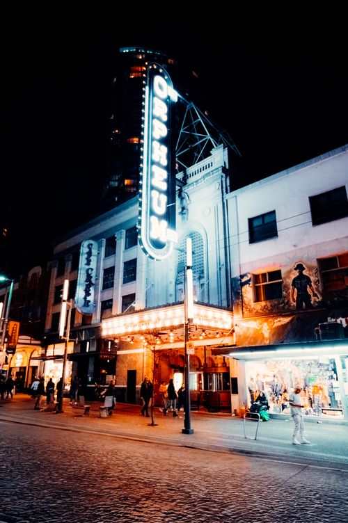 Free Dazzling neon lights at the historic Orpheum Theatre, Vancouver, capturing urban nightlife. Stock Photo