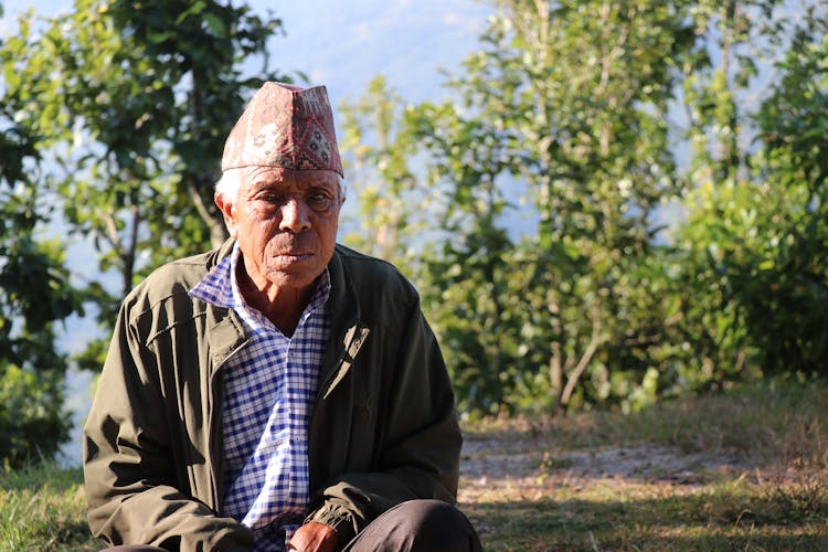 Old Man In Ornate Traditional Hat 