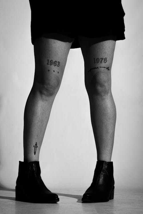 Legs of Woman with Tattoos