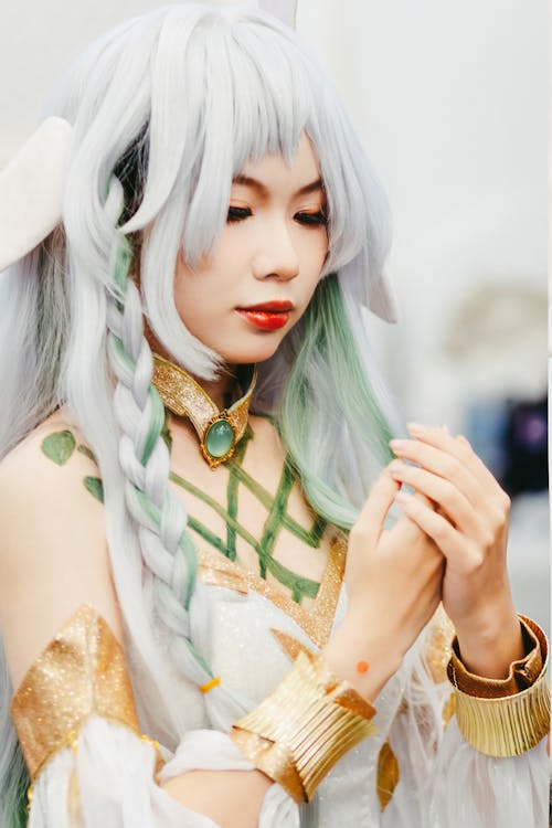 Woman in Cosplay Costume with White Hair