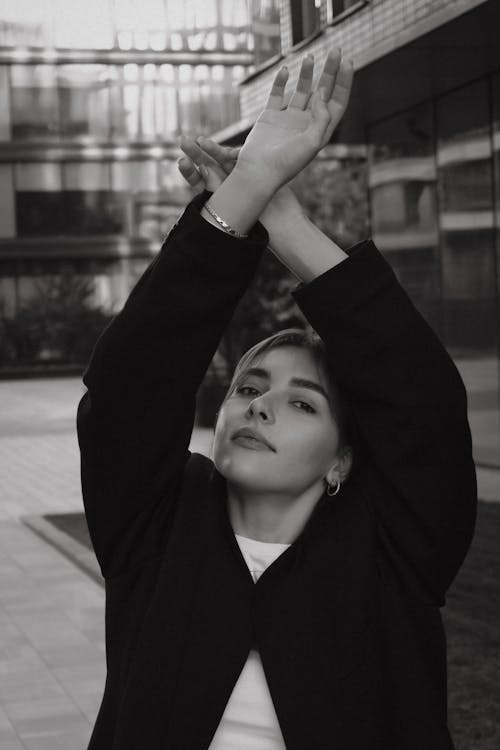 Woman Raising her Arms in Black and White