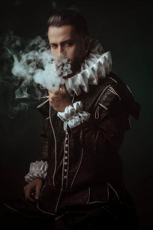 Man in a Costume Smoking 