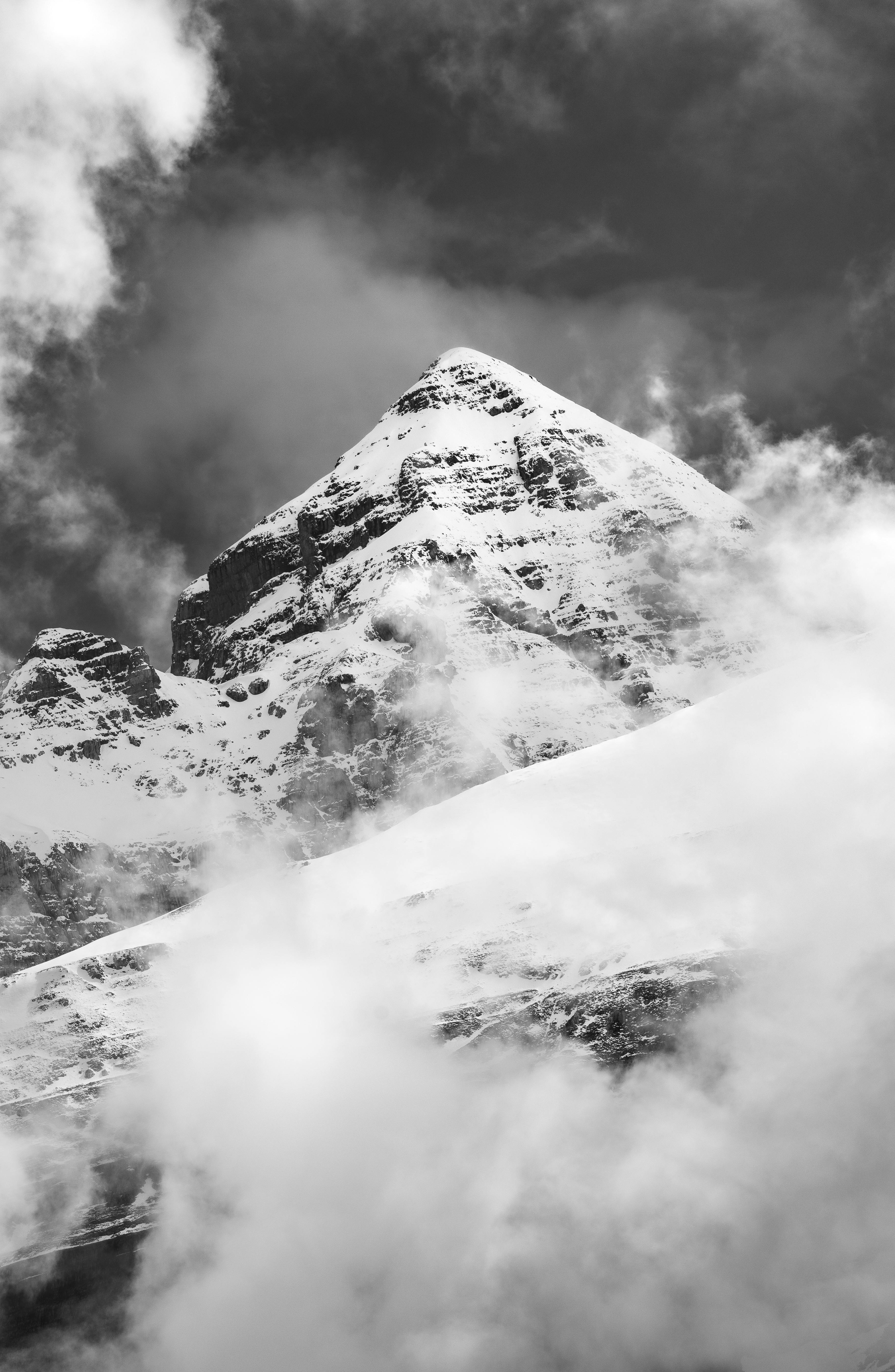 rocks between clouds