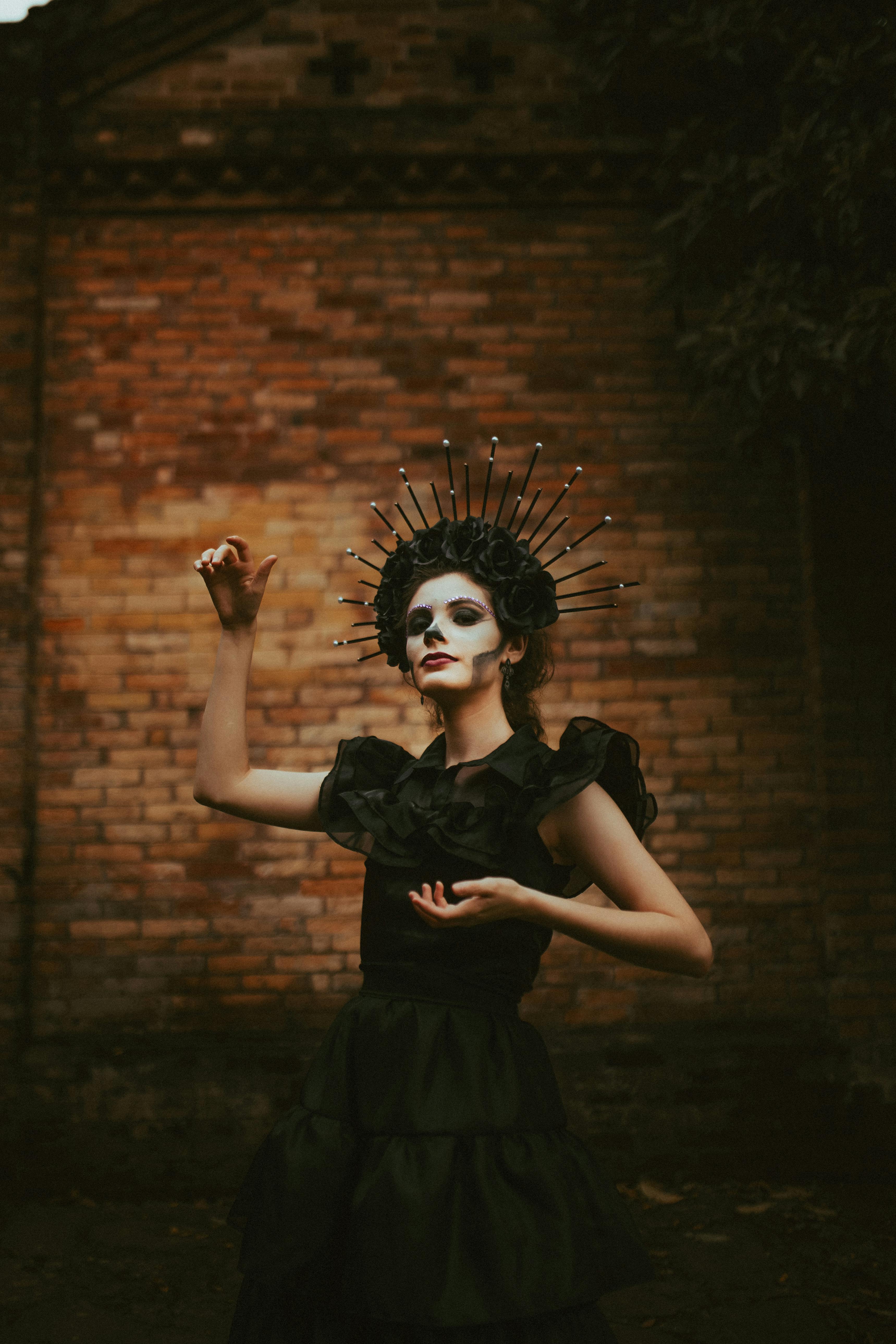 woman in costume and makeup day of the dead