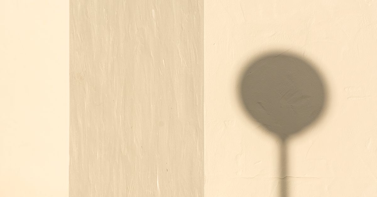 Circular Inner Shadow Circular Shadow on a Light Wall · Free Stock Photo