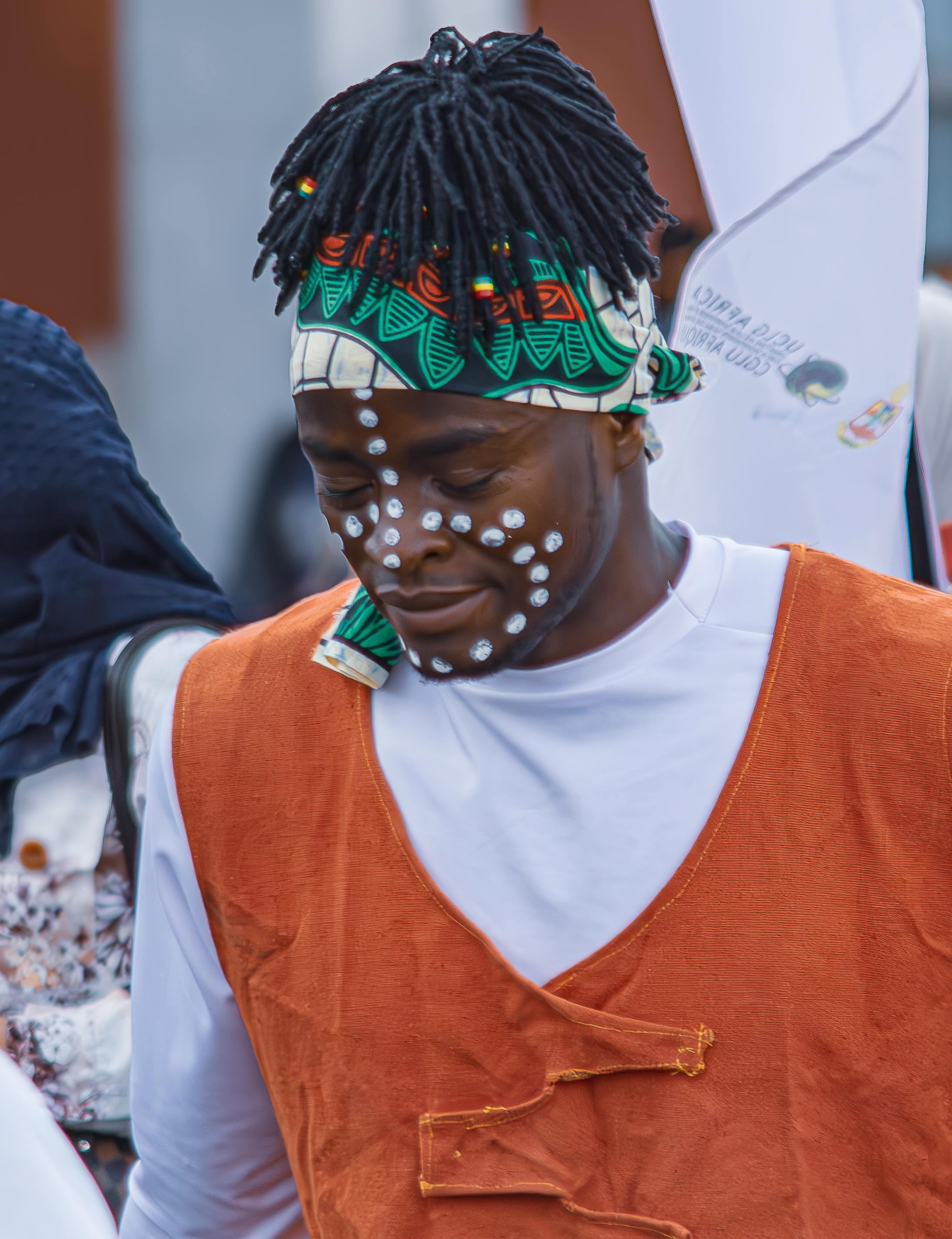 free photo of man in tribal face paint