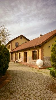 Beautiful stone building with cobblestone path in Kocaeli, Türkiye, highlighting architectural charm.