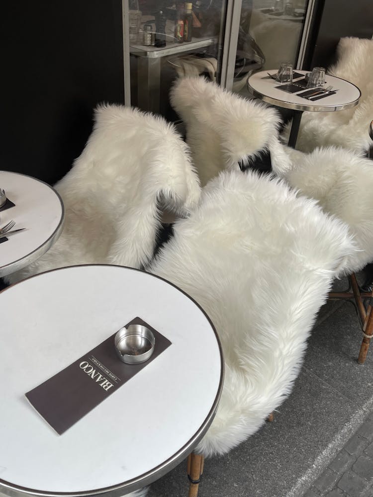 Tables And Chairs In A Restaurant 