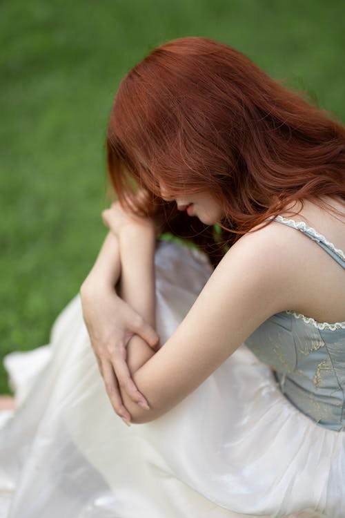 A Young Woman with Red Hair