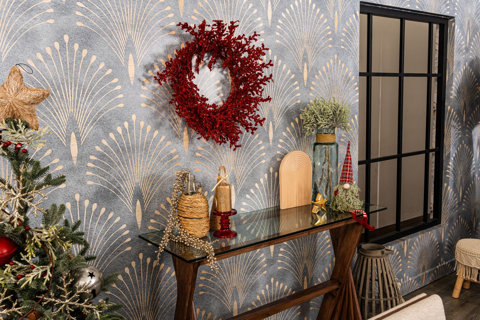 elegant interior with festive Christmas decorations and red wreath on patterned walls, landscape
