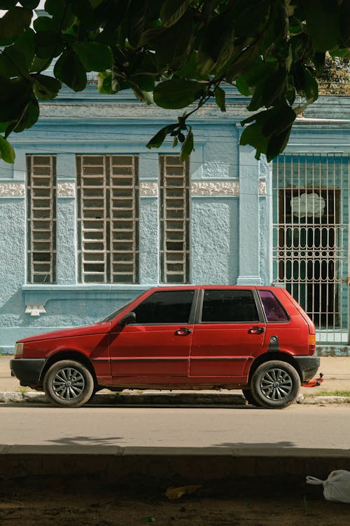 Red FIAT Uno on Street