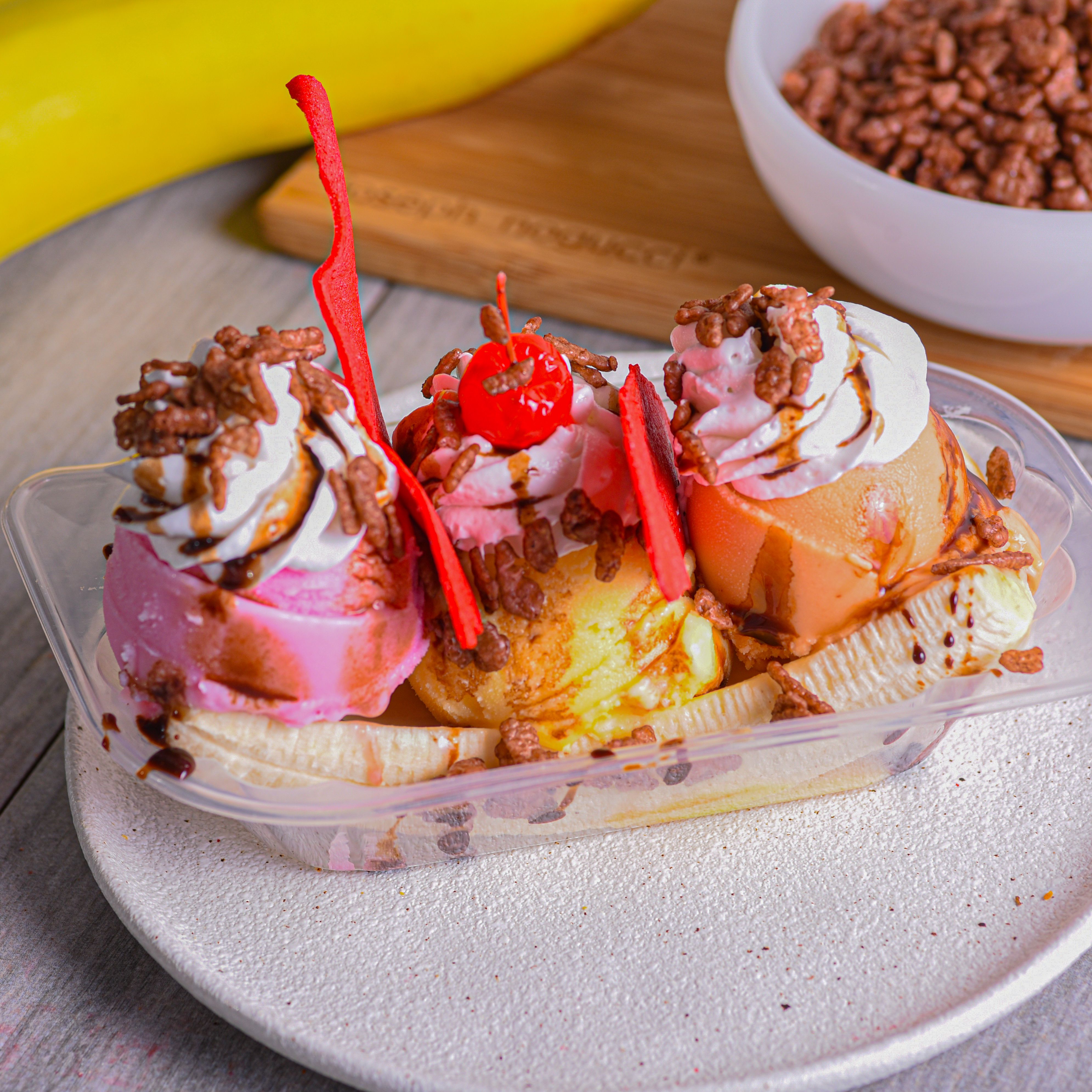 Banana split dessert with ice cream — photo by Diego Romero on Pexels