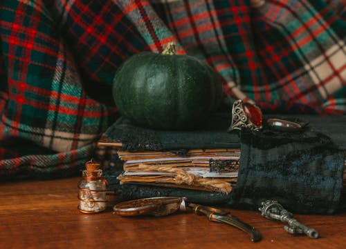 Green Pumpkin and on Ring on Old Manuscript