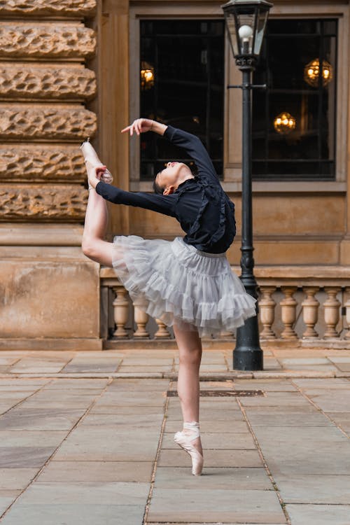 Ballerina Dancing in City