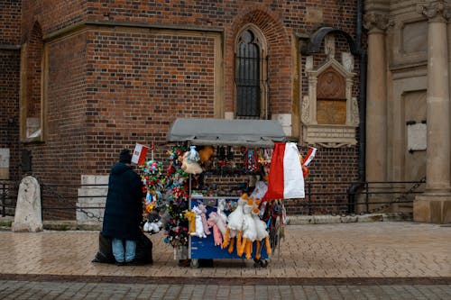 Merchant with Cart by Saint Marys Basilica in Krakow