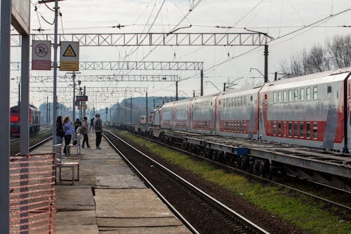 People Waiting at Railway Station