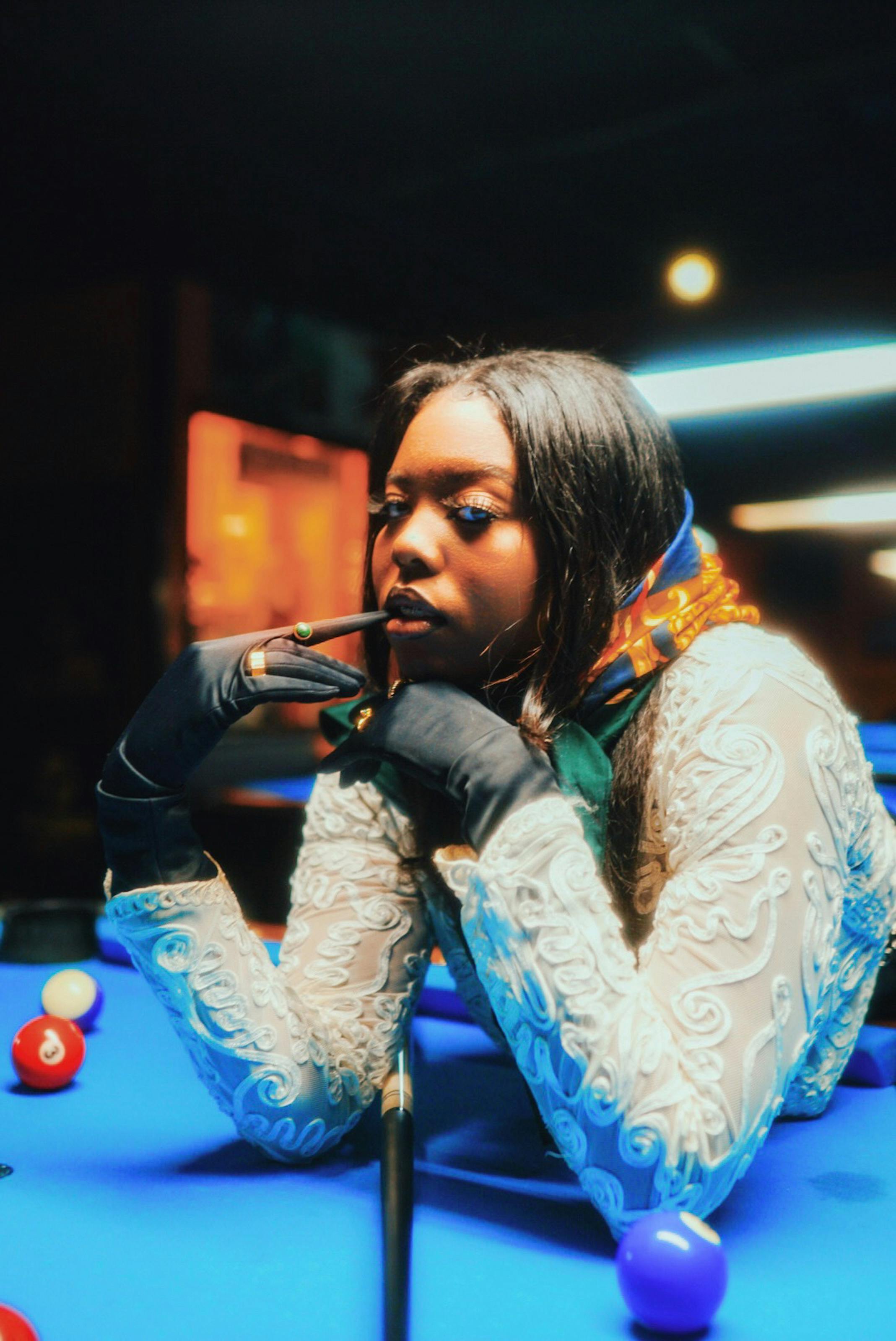 girl playing pool