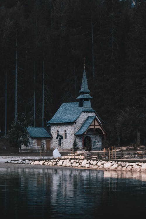 Chapel by Pragser Wildsee Lake in Dolomites, Italy