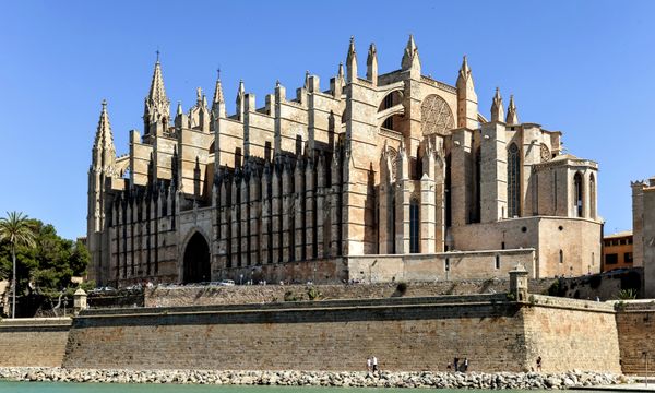 Majestic Gothic cathedral facade in Palma, Mallorca, Spain by the waterfront.