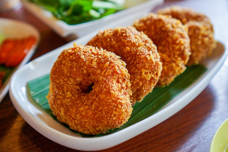 Fried Shrimp Cakes Served In A Restaurant 