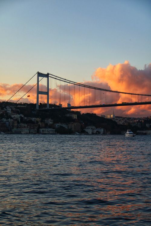 Free Stunning view of the Bosphorus Bridge at sunrise, spanning Istanbul's vibrant landscape. Stock Photo