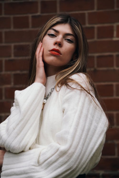 Young Woman Wearing a White Sweater 