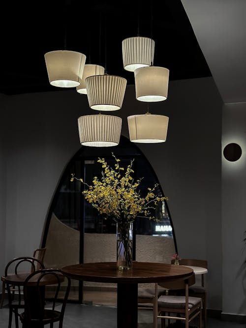 Designer Interior with Lampshades Hanging over a Table