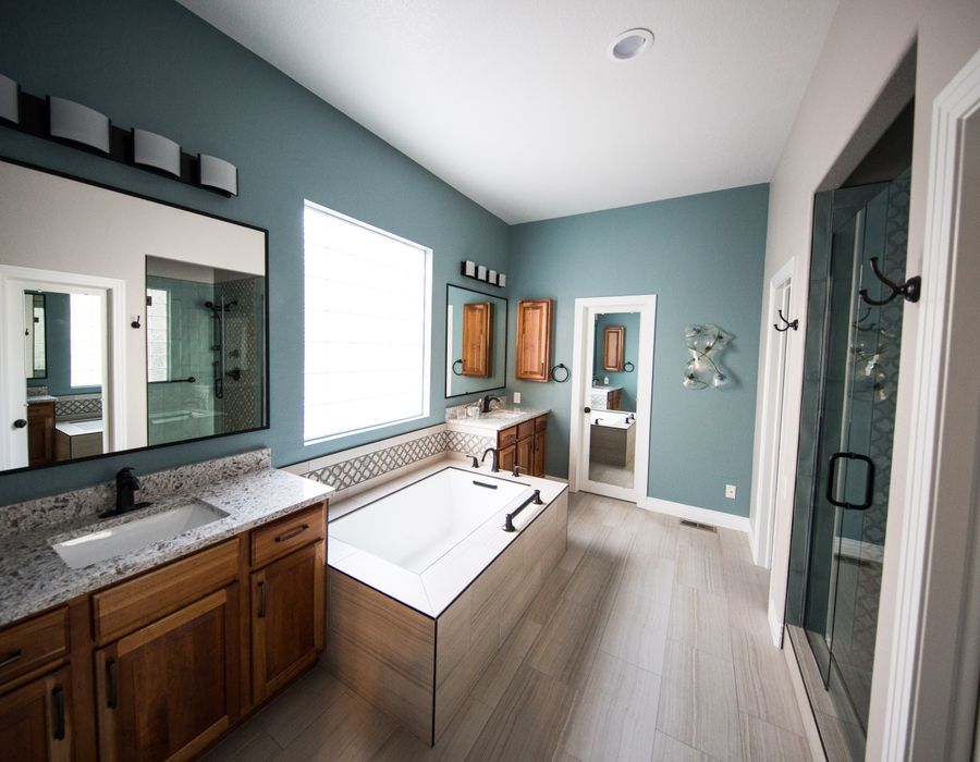 Freestanding bathtub installation in a remodeled bathroom in Upland, CA