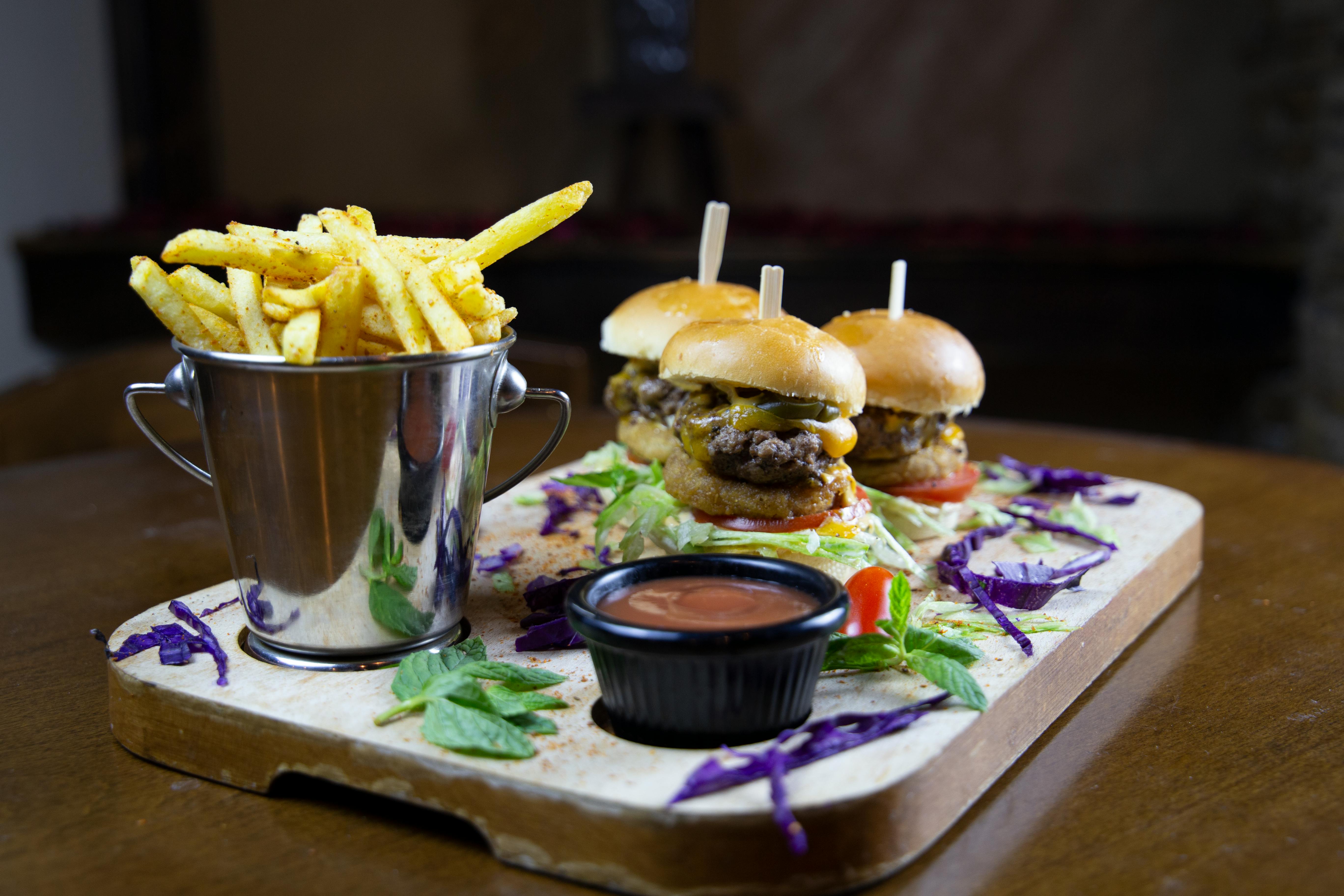 Mini Burger Sliders In A Bento Box With Colorful Ingredients And Picks