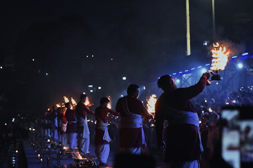 Blue Toned Night Performance with Torches