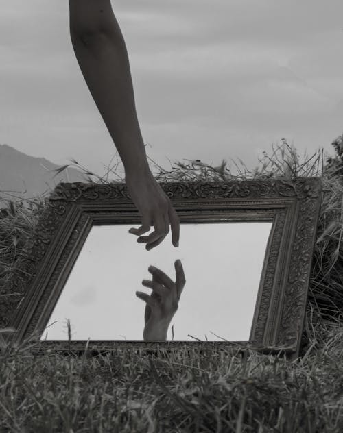 Hand Reflecting in Mirror