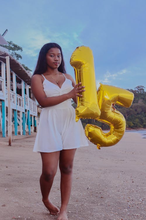 Teenage Girl Holding Balloons 