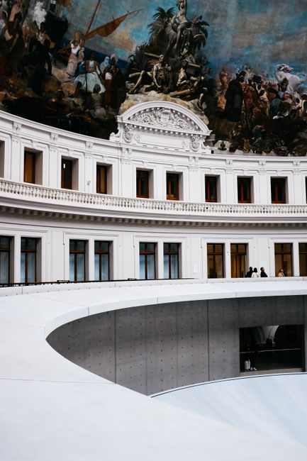 High-angle view of Bourse de Commerce with its intricate paintings and modern architecture, Paris.