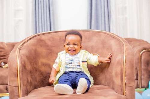 Smiling Child Model in Jeans