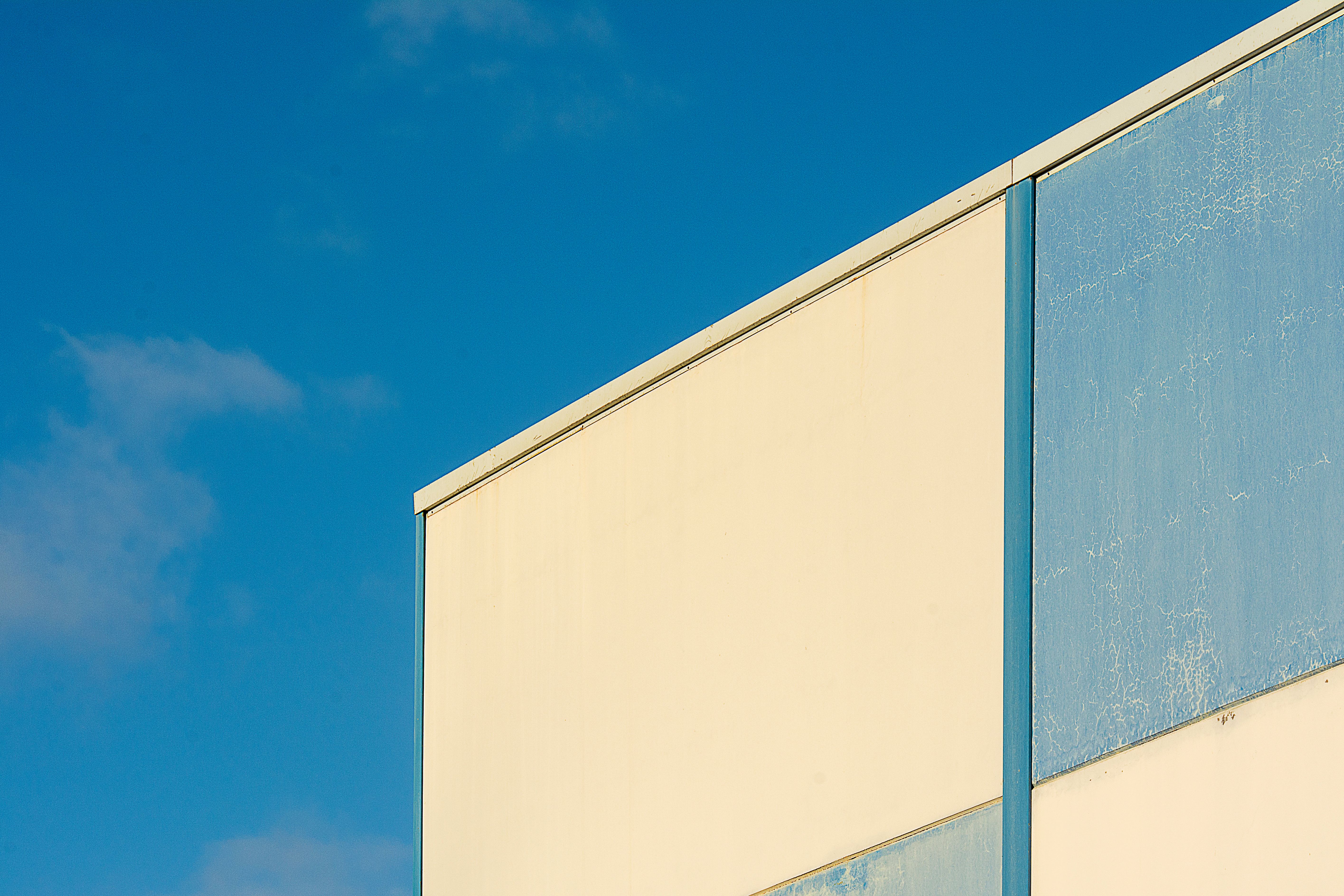 Modern Industrial Building with Blue Facade · Free Stock Photo