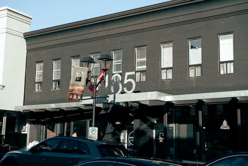 Exterior of a Building in City and Cars on the Street 