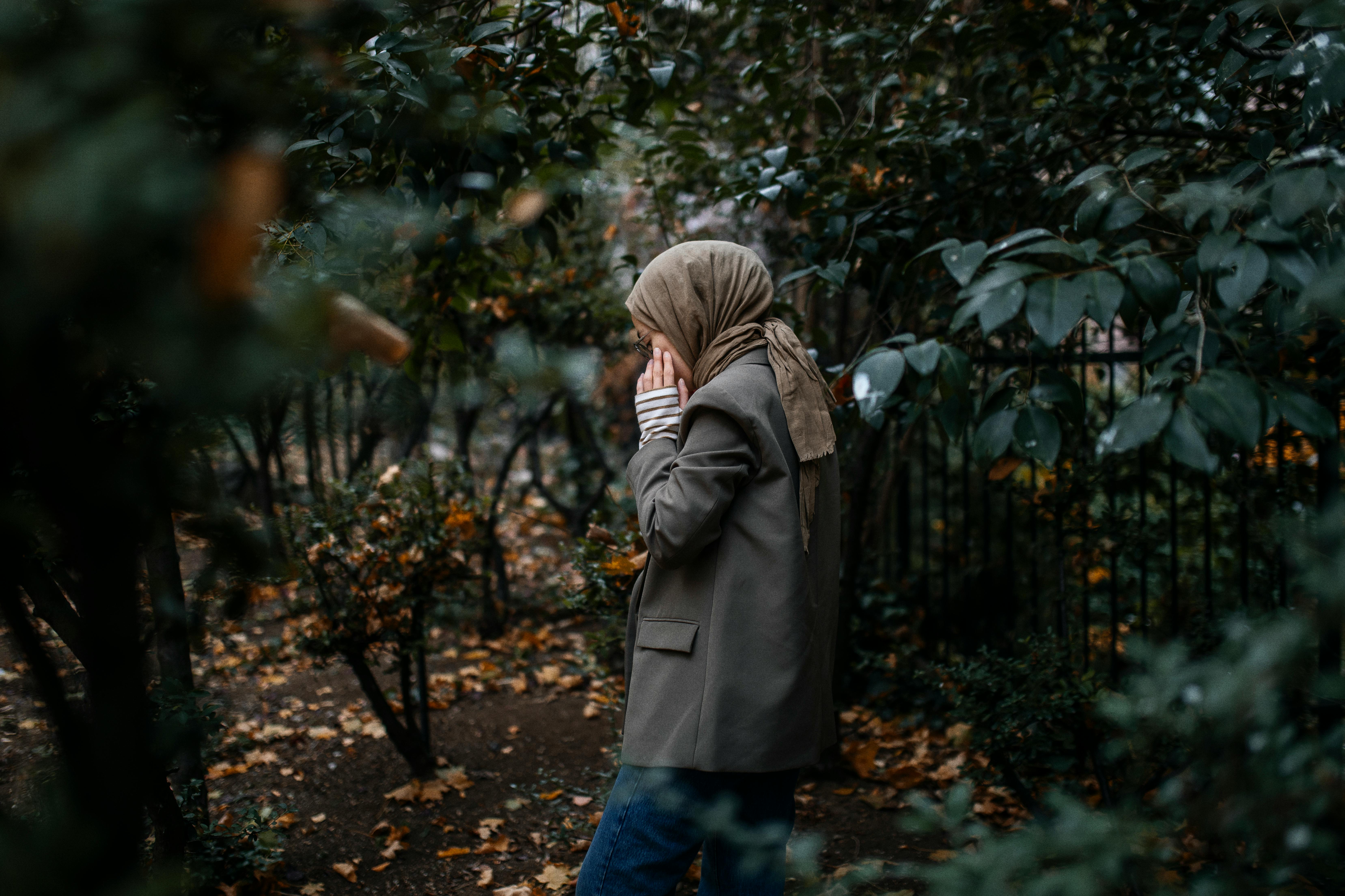 Woman Standing in a Park in Autumn · Free Stock Photo