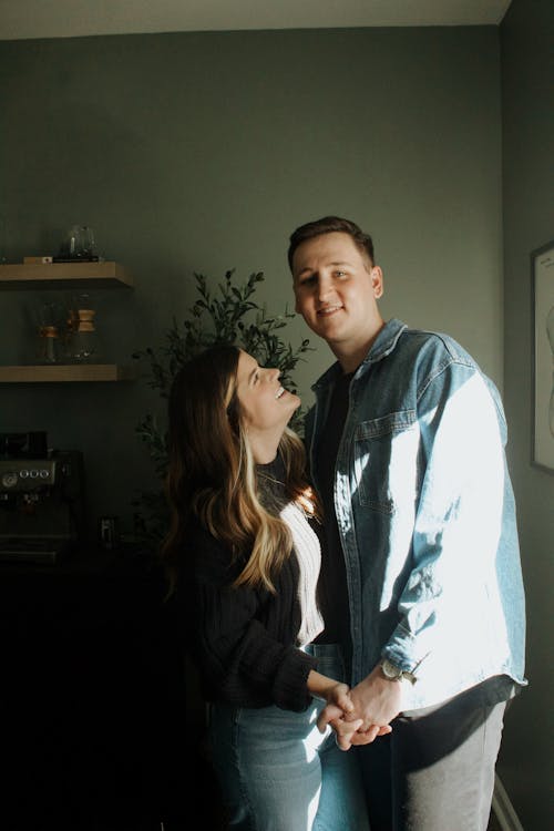 Smiling Couple Holding Hands