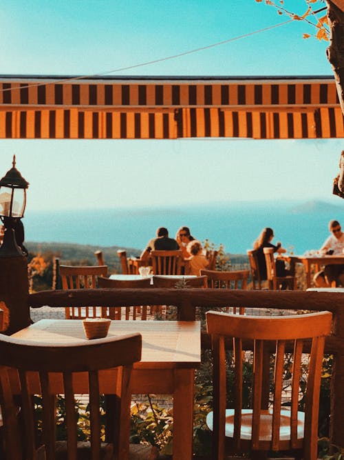 People Sitting at Restaurant Terrace