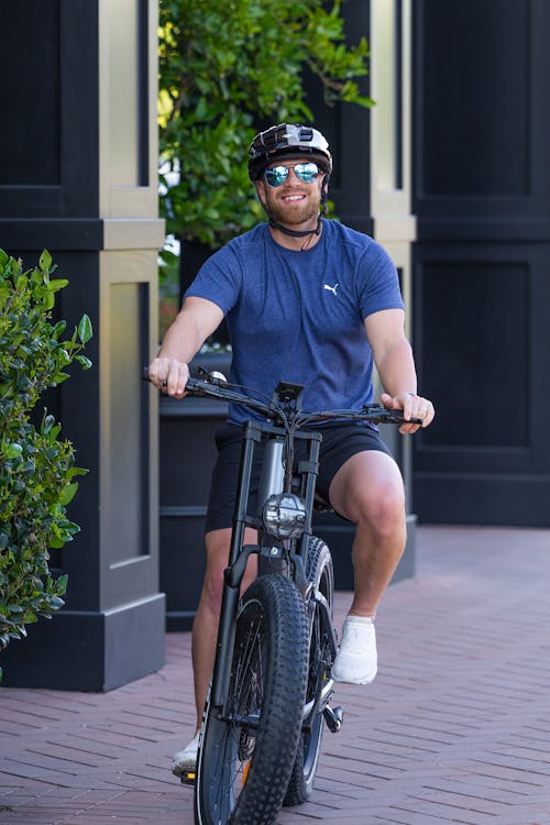 Smiling Man on Bike