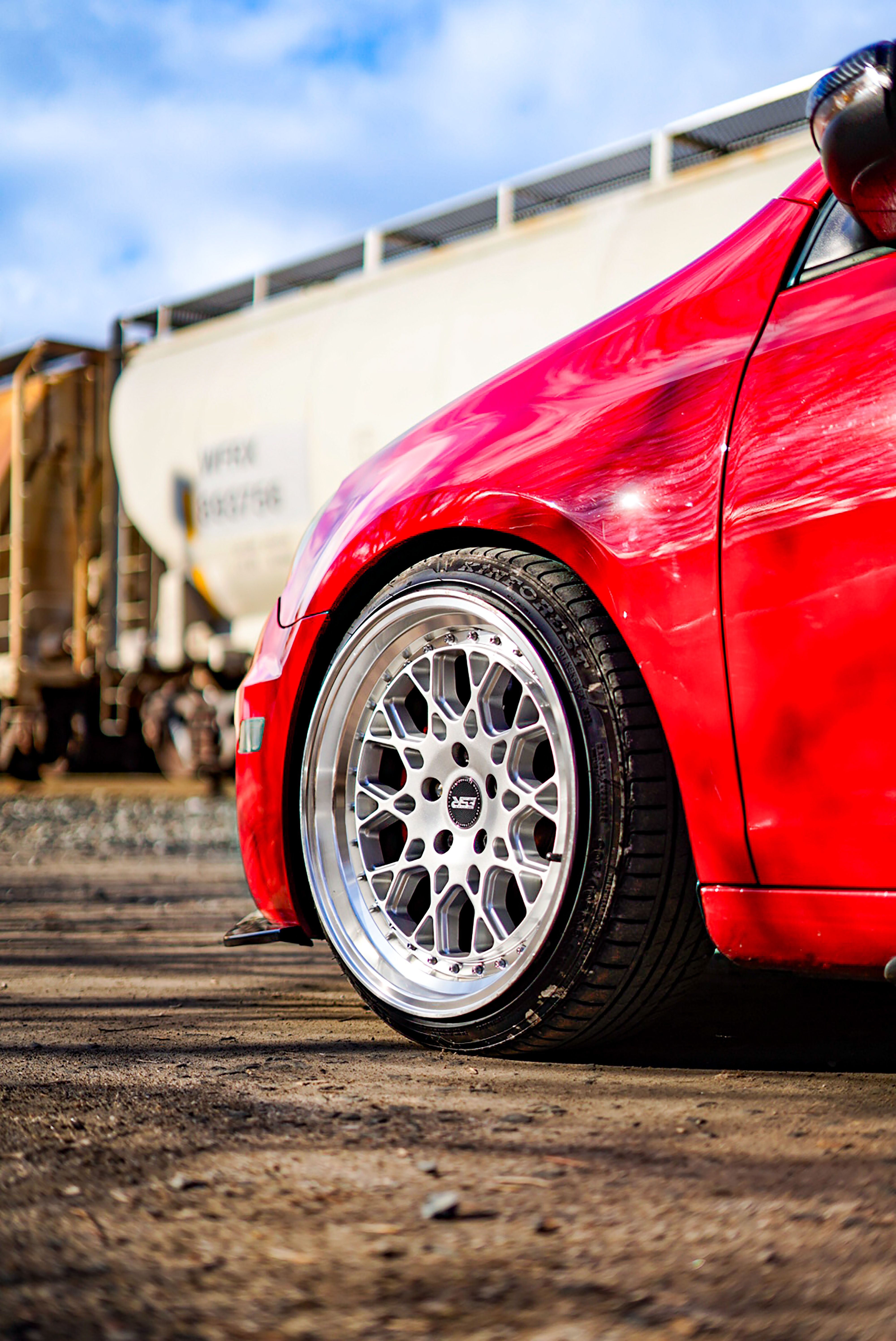 Tire of Red Car · Free Stock Photo